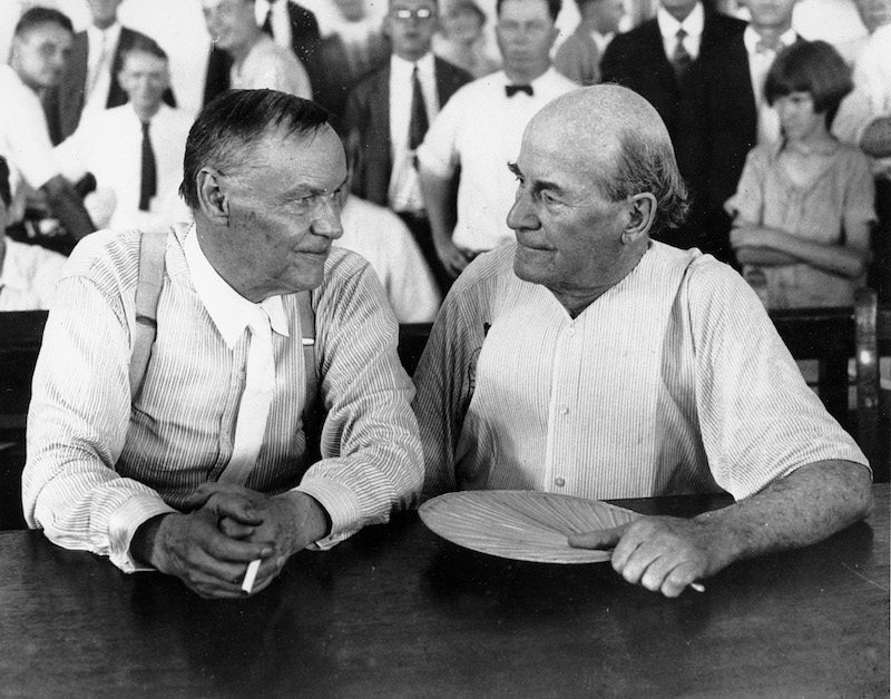 Clarence Darrow, left, and William Jennings Bryan speak with each other at the "monkey trial" in Dayton, Tenn. in 1925.  Darrow was one of three lawyers sent to Dayton by the American Civil Liberties Union (ACLU).  They defended John T. Scopes, a biology teacher, in his test of Tennessee's law banning the teaching of evolution.  Bryan testified for the prosecution as a bible expert.  (AP Photo)