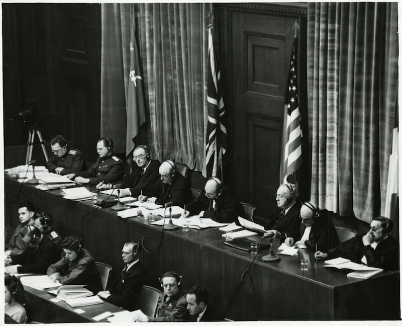 Judges sitting in Nuremberg, from left to right Volchkov, Nikitchenko, Birkett, Sir Geoffrey Lawrence, Biddle, Parker, Donnedieu de Vabres and Falco
